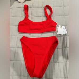 Good American bikini in size 1/2. New condition with tags. Never worn.